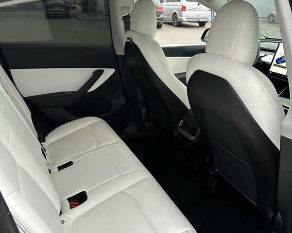 Синий Тесла Model Y, объемом двигателя 0 л и пробегом 211 тыс. км за 18200 $, фото 17 на Automoto.ua