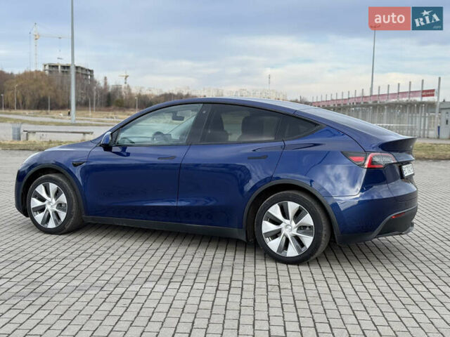 Синий Тесла Model Y, объемом двигателя 0 л и пробегом 83 тыс. км за 23800 $, фото 4 на Automoto.ua
