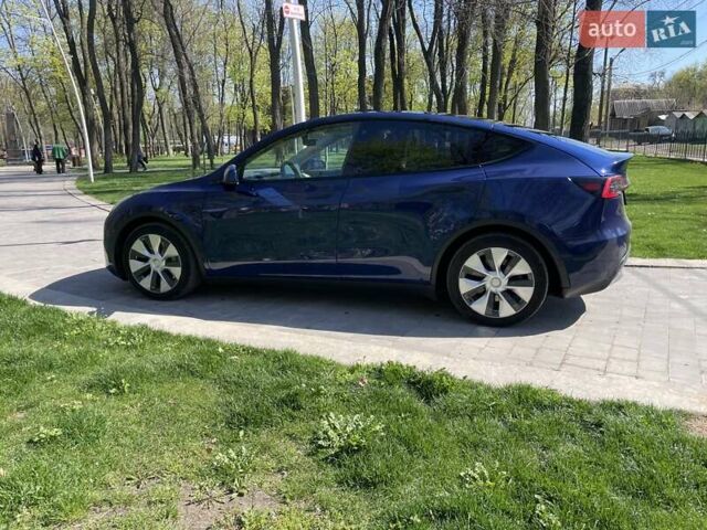 Синий Тесла Model Y, объемом двигателя 0 л и пробегом 115 тыс. км за 22800 $, фото 2 на Automoto.ua