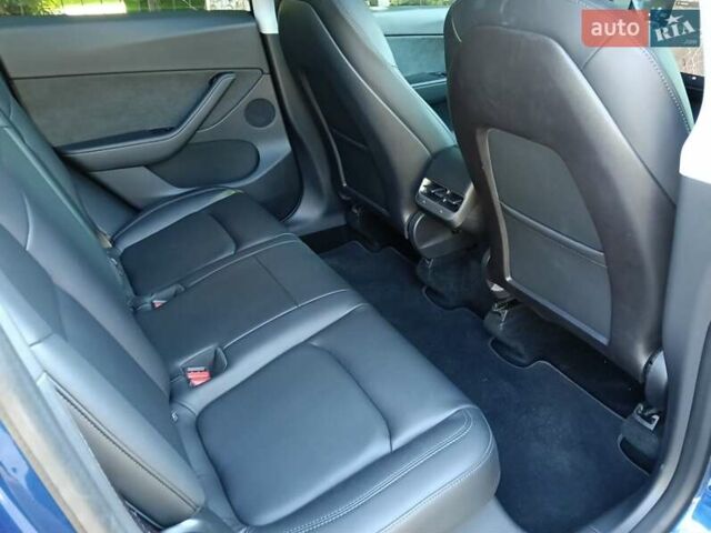 Синий Тесла Model Y, объемом двигателя 0 л и пробегом 65 тыс. км за 25000 $, фото 14 на Automoto.ua