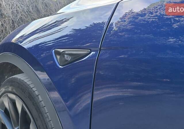 Синій Тесла Model Y, об'ємом двигуна 0 л та пробігом 110 тис. км за 24900 $, фото 32 на Automoto.ua