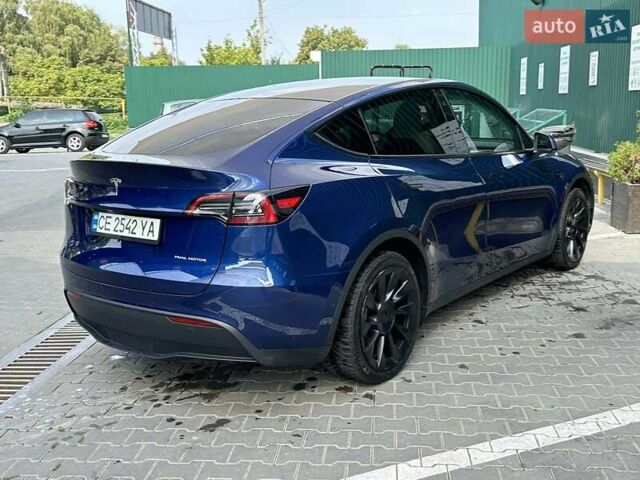 Синий Тесла Model Y, объемом двигателя 0 л и пробегом 73 тыс. км за 27000 $, фото 1 на Automoto.ua