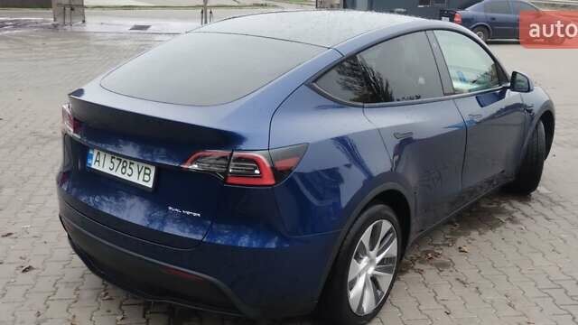 Синий Тесла Model Y, объемом двигателя 0 л и пробегом 261 тыс. км за 19600 $, фото 19 на Automoto.ua