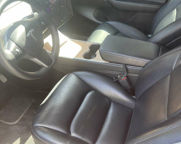 Синий Тесла Model Y, объемом двигателя 0 л и пробегом 147 тыс. км за 21999 $, фото 4 на Automoto.ua