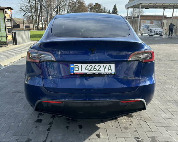 Синій Тесла Model Y, об'ємом двигуна 0 л та пробігом 51 тис. км за 23499 $, фото 5 на Automoto.ua