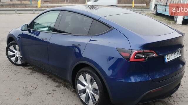 Синий Тесла Model Y, объемом двигателя 0 л и пробегом 261 тыс. км за 19600 $, фото 22 на Automoto.ua