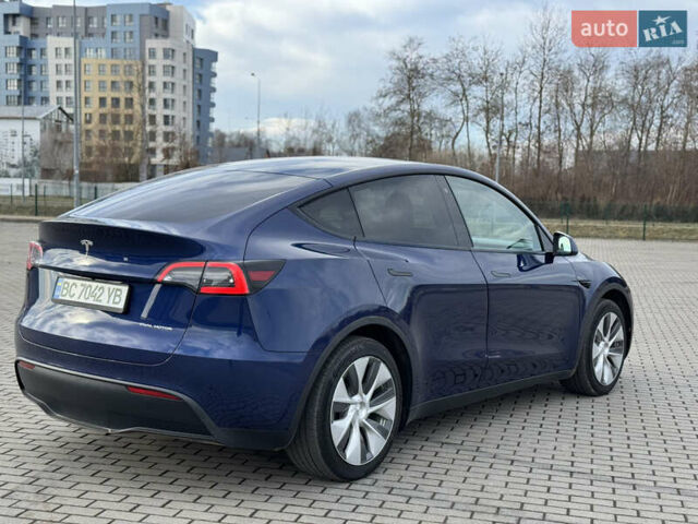 Синий Тесла Model Y, объемом двигателя 0 л и пробегом 83 тыс. км за 23800 $, фото 10 на Automoto.ua