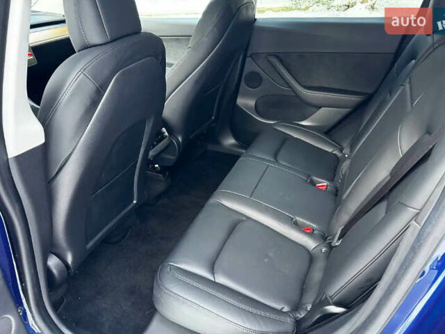 Синий Тесла Model Y, объемом двигателя 0 л и пробегом 55 тыс. км за 28000 $, фото 19 на Automoto.ua
