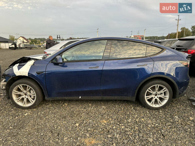 Синий Тесла Model Y, объемом двигателя 0 л и пробегом 186 тыс. км за 16000 $, фото 5 на Automoto.ua