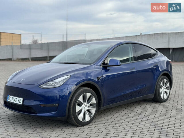 Синий Тесла Model Y, объемом двигателя 0 л и пробегом 83 тыс. км за 23800 $, фото 1 на Automoto.ua