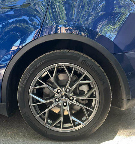 Синий Тесла Model Y, объемом двигателя 0 л и пробегом 63 тыс. км за 23000 $, фото 3 на Automoto.ua