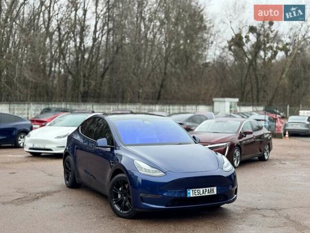 Синій Тесла Model Y, об'ємом двигуна 0 л та пробігом 77 тис. км за 22999 $, фото 1 на Automoto.ua