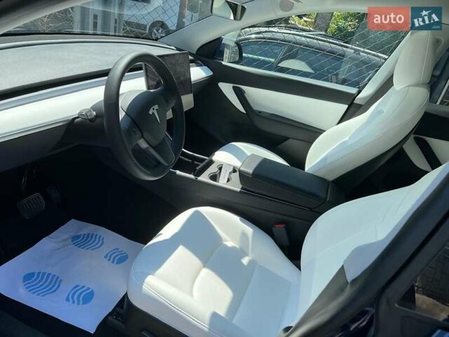 Синий Тесла Model Y, объемом двигателя 0 л и пробегом 70 тыс. км за 25500 $, фото 12 на Automoto.ua