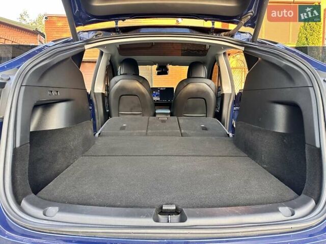 Синій Тесла Model Y, об'ємом двигуна 0 л та пробігом 163 тис. км за 20900 $, фото 40 на Automoto.ua