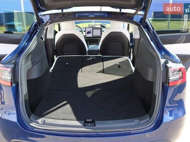Синий Тесла Model Y, объемом двигателя 0 л и пробегом 70 тыс. км за 25500 $, фото 44 на Automoto.ua