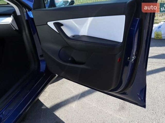 Синий Тесла Model Y, объемом двигателя 0 л и пробегом 70 тыс. км за 25500 $, фото 40 на Automoto.ua