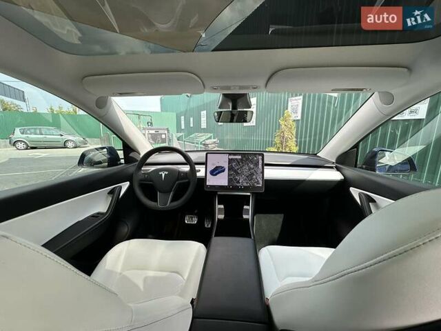 Синий Тесла Model Y, объемом двигателя 0 л и пробегом 73 тыс. км за 27000 $, фото 4 на Automoto.ua
