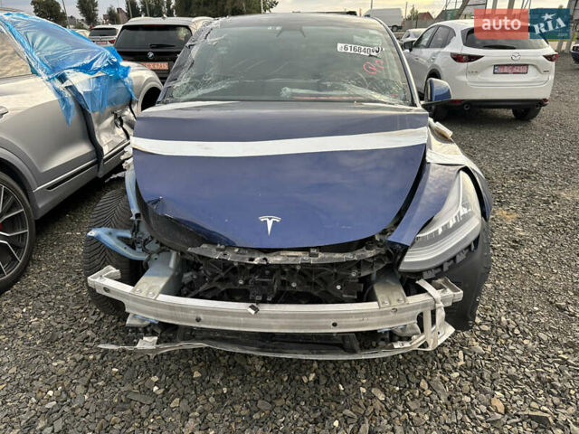 Синий Тесла Model Y, объемом двигателя 0 л и пробегом 186 тыс. км за 16000 $, фото 2 на Automoto.ua