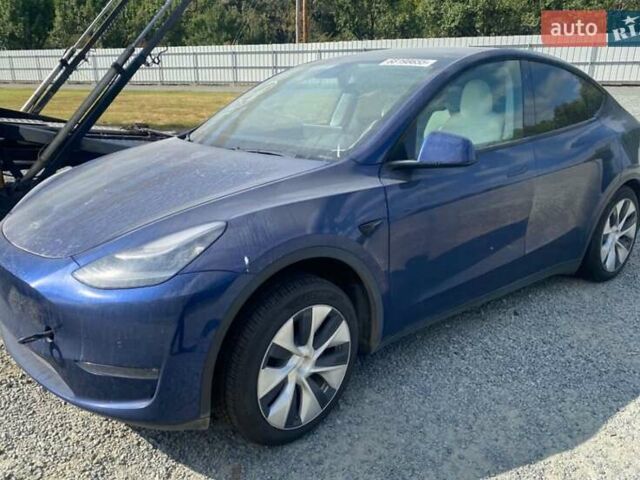 Синий Тесла Model Y, объемом двигателя 0 л и пробегом 136 тыс. км за 18100 $, фото 1 на Automoto.ua
