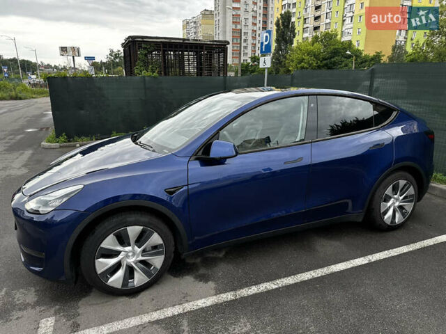 Синій Тесла Model Y, об'ємом двигуна 0 л та пробігом 82 тис. км за 26500 $, фото 2 на Automoto.ua