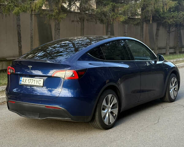 Синий Тесла Model Y, объемом двигателя 0 л и пробегом 97 тыс. км за 26500 $, фото 13 на Automoto.ua