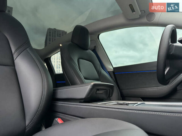 Синий Тесла Model Y, объемом двигателя 0 л и пробегом 88 тыс. км за 31990 $, фото 1 на Automoto.ua