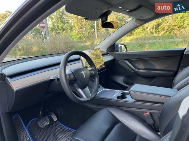Синий Тесла Model Y, объемом двигателя 0 л и пробегом 68 тыс. км за 25000 $, фото 19 на Automoto.ua