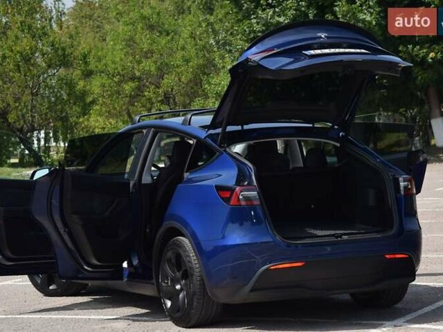Синий Тесла Model Y, объемом двигателя 0 л и пробегом 81 тыс. км за 25499 $, фото 19 на Automoto.ua