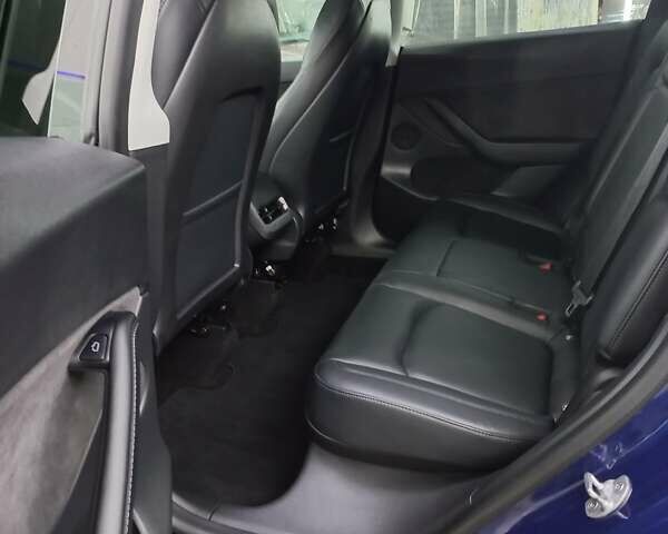 Синий Тесла Model Y, объемом двигателя 0 л и пробегом 91 тыс. км за 25850 $, фото 8 на Automoto.ua