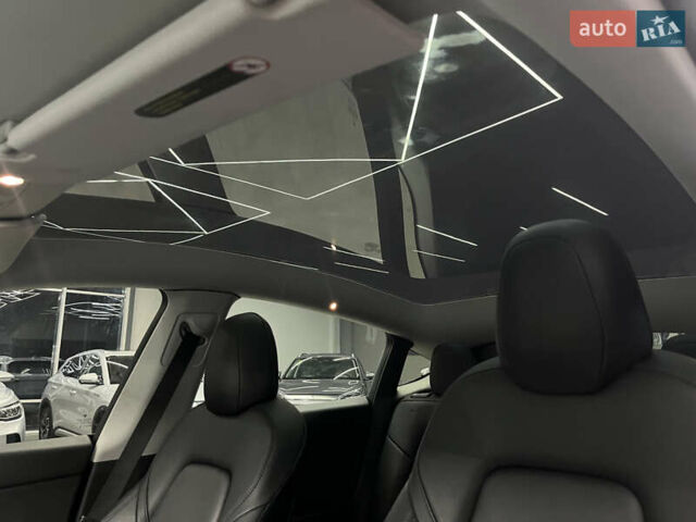 Синий Тесла Model Y, объемом двигателя 0 л и пробегом 68 тыс. км за 29900 $, фото 13 на Automoto.ua