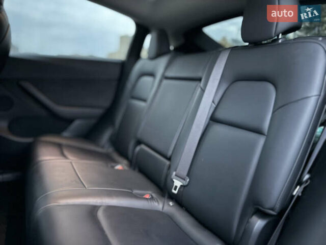 Тесла Model Y 2021 в Харькове на Automoto.ua Синий Тесла Model Y, объемом двигателя 0 л и пробегом 113 тыс. км за 21200 $, фото 60 на Automoto.ua