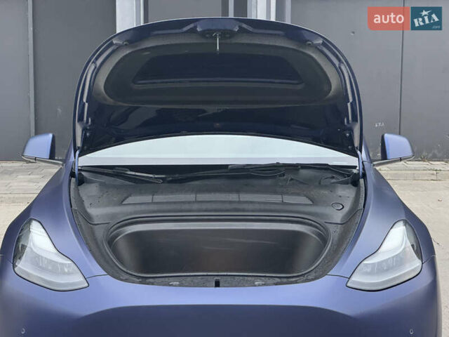 Синий Тесла Model Y, объемом двигателя 0 л и пробегом 88 тыс. км за 31990 $, фото 15 на Automoto.ua
