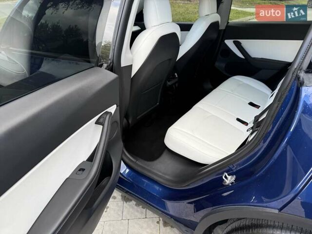 Синий Тесла Model Y, объемом двигателя 0 л и пробегом 87 тыс. км за 23900 $, фото 38 на Automoto.ua