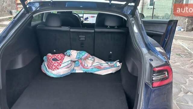 Синий Тесла Model Y, объемом двигателя 0 л и пробегом 74 тыс. км за 26500 $, фото 11 на Automoto.ua