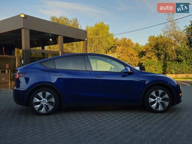 Синий Тесла Model Y, объемом двигателя 0 л и пробегом 99 тыс. км за 26500 $, фото 13 на Automoto.ua