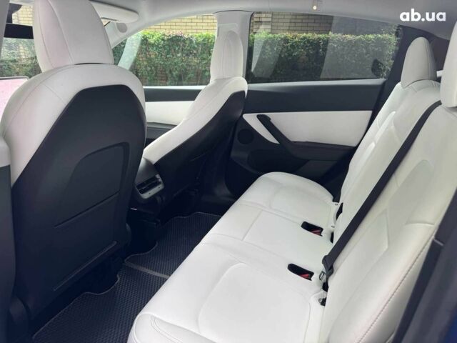 Тесла Model Y 2021 в Киеве на Automoto.ua Синий Тесла Model Y, объемом двигателя 0 л и пробегом 86 тыс. км за 19390 $, фото 19 на Automoto.ua