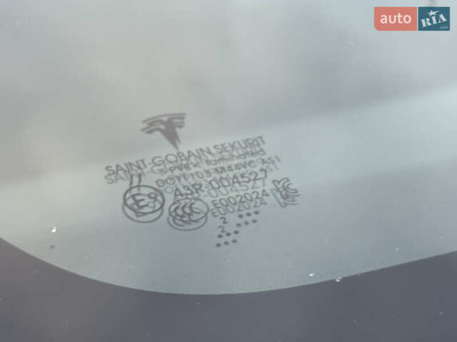 Синий Тесла Model Y, объемом двигателя 0 л и пробегом 88 тыс. км за 31990 $, фото 14 на Automoto.ua