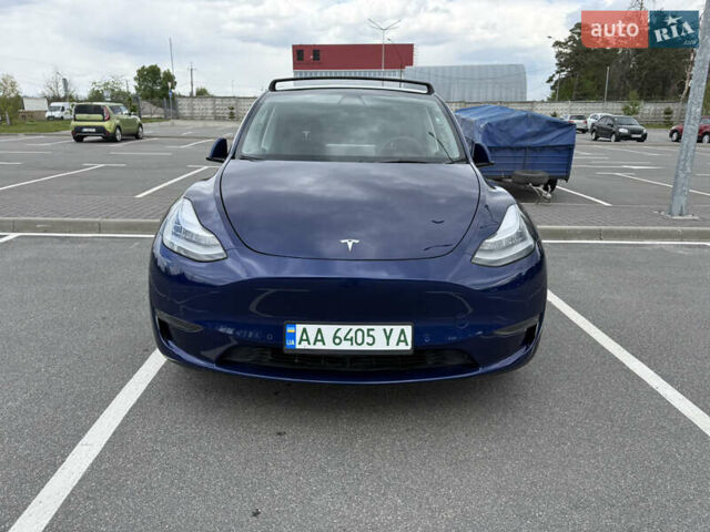Синій Тесла Model Y, об'ємом двигуна 0 л та пробігом 77 тис. км за 28500 $, фото 1 на Automoto.ua