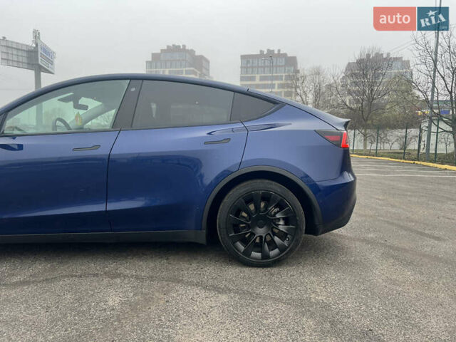 Синий Тесла Model Y, объемом двигателя 0 л и пробегом 125 тыс. км за 25997 $, фото 29 на Automoto.ua
