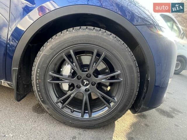 Синий Тесла Model Y, объемом двигателя 0 л и пробегом 101 тыс. км за 23999 $, фото 23 на Automoto.ua