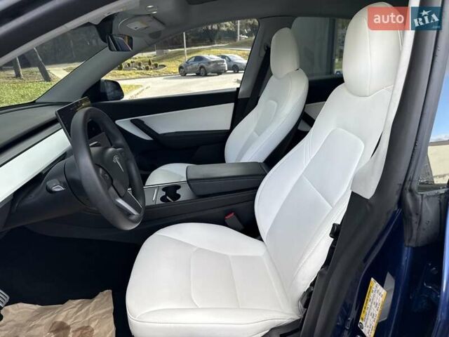 Синий Тесла Model Y, объемом двигателя 0 л и пробегом 86 тыс. км за 25900 $, фото 75 на Automoto.ua