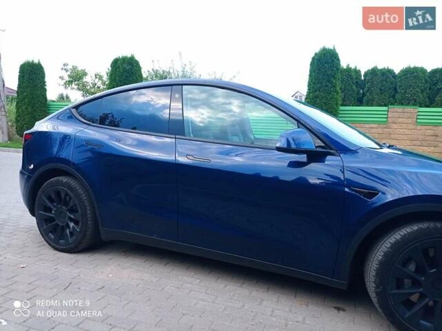 Синий Тесла Model Y, объемом двигателя 0 л и пробегом 69 тыс. км за 24900 $, фото 9 на Automoto.ua