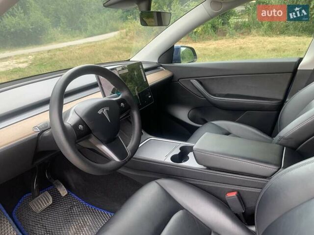 Синий Тесла Model Y, объемом двигателя 0 л и пробегом 75 тыс. км за 22900 $, фото 13 на Automoto.ua