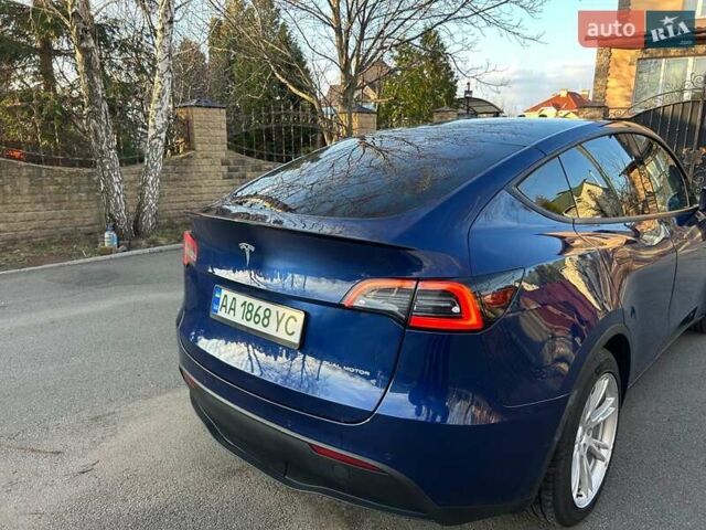 Синий Тесла Model Y, объемом двигателя 0 л и пробегом 62 тыс. км за 25800 $, фото 4 на Automoto.ua