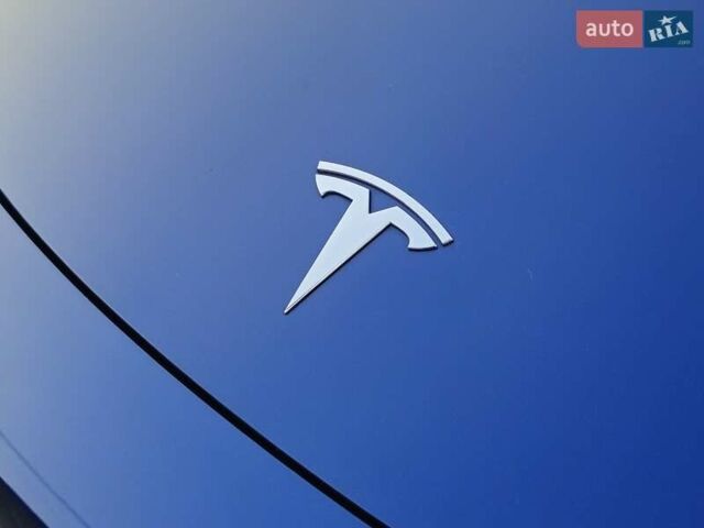 Синий Тесла Model Y, объемом двигателя 0 л и пробегом 99 тыс. км за 25900 $, фото 36 на Automoto.ua