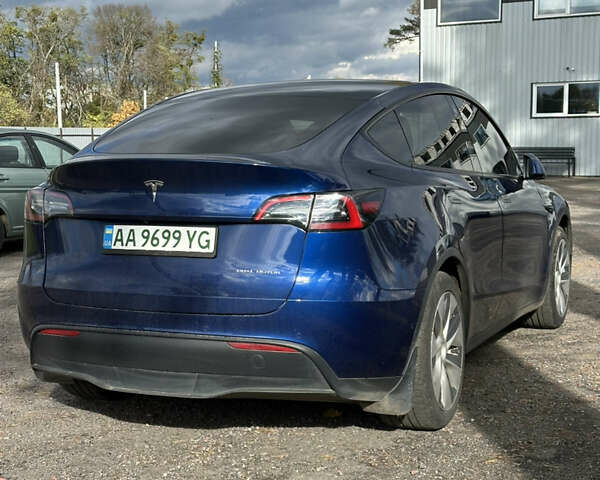 Синий Тесла Model Y, объемом двигателя 0 л и пробегом 116 тыс. км за 22999 $, фото 3 на Automoto.ua