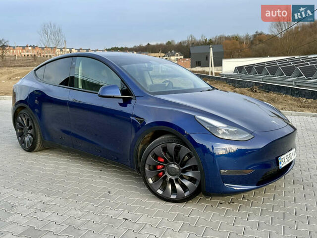 Синий Тесла Model Y, объемом двигателя 0 л и пробегом 116 тыс. км за 23900 $, фото 2 на Automoto.ua