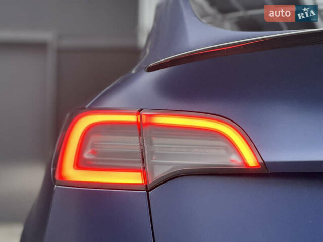 Синий Тесла Model Y, объемом двигателя 0 л и пробегом 88 тыс. км за 31990 $, фото 17 на Automoto.ua