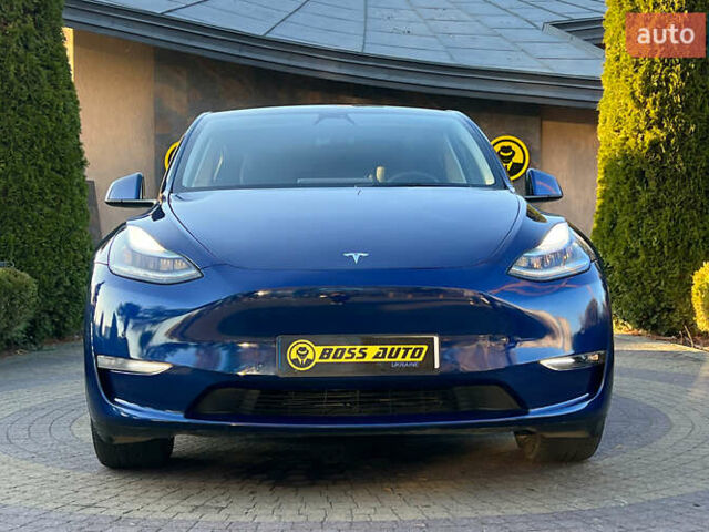 Синий Тесла Model Y, объемом двигателя 0 л и пробегом 72 тыс. км за 25750 $, фото 1 на Automoto.ua