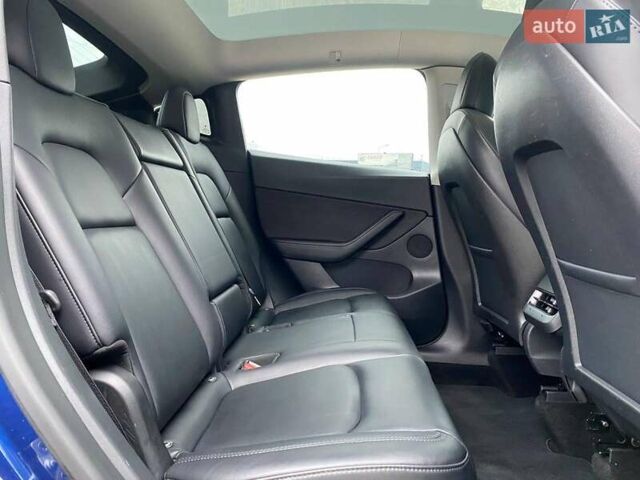 Синій Тесла Model Y, об'ємом двигуна 0 л та пробігом 91 тис. км за 25990 $, фото 20 на Automoto.ua